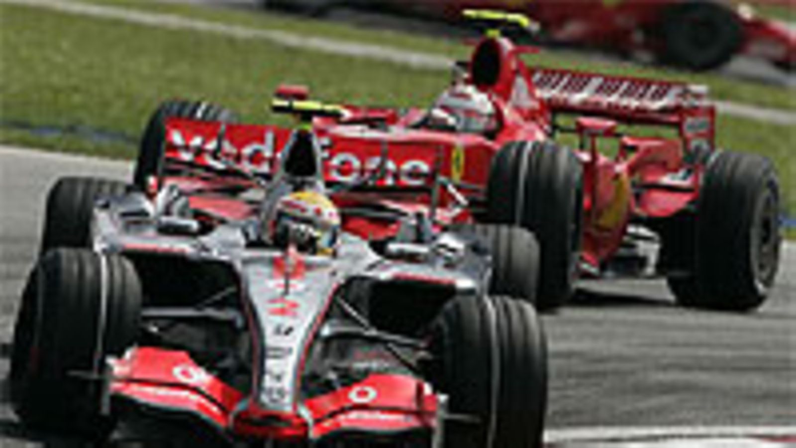 Lewis Hamilton ja Kimi Räikkönen, kuva: McLaren