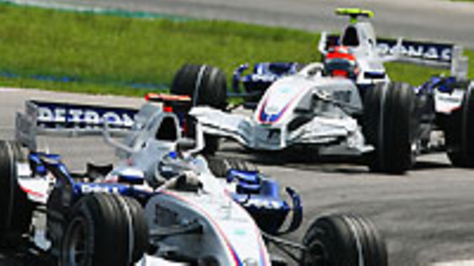 Nick Heidfeld ja Robert Kubica (Kuva: Paul Gilham/Getty Images)