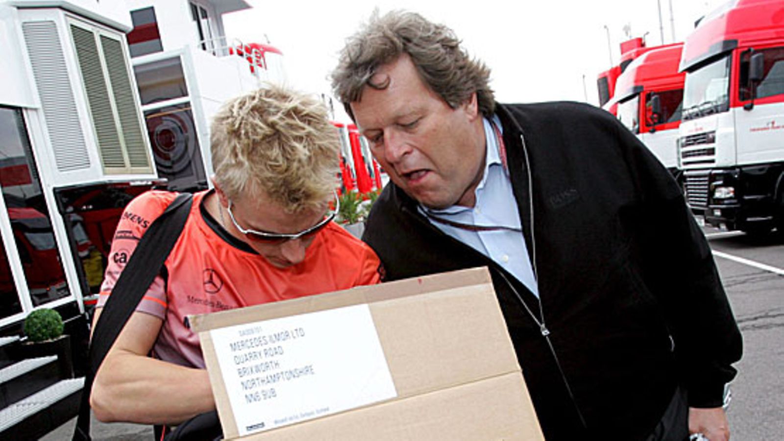 Kimi Räikkönen ja Norbert Haug vuonna 2005. Kuva: Rainer Jensen/EPA.