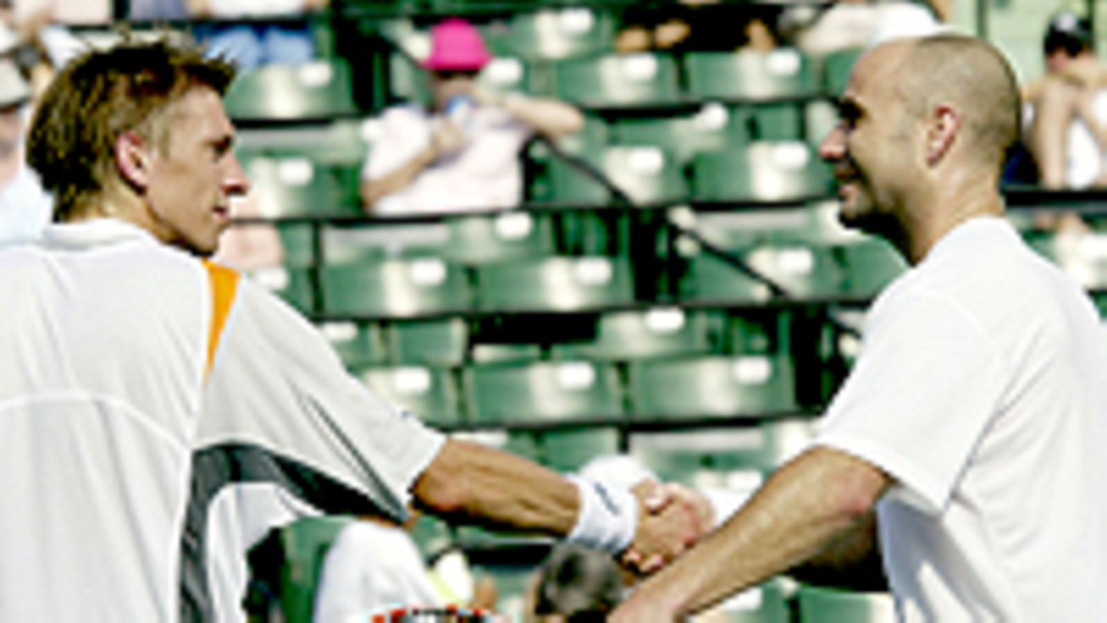 Jarkko Nieminen ja Andre Agassi (Photo: Clive Brunskill/Getty Images)