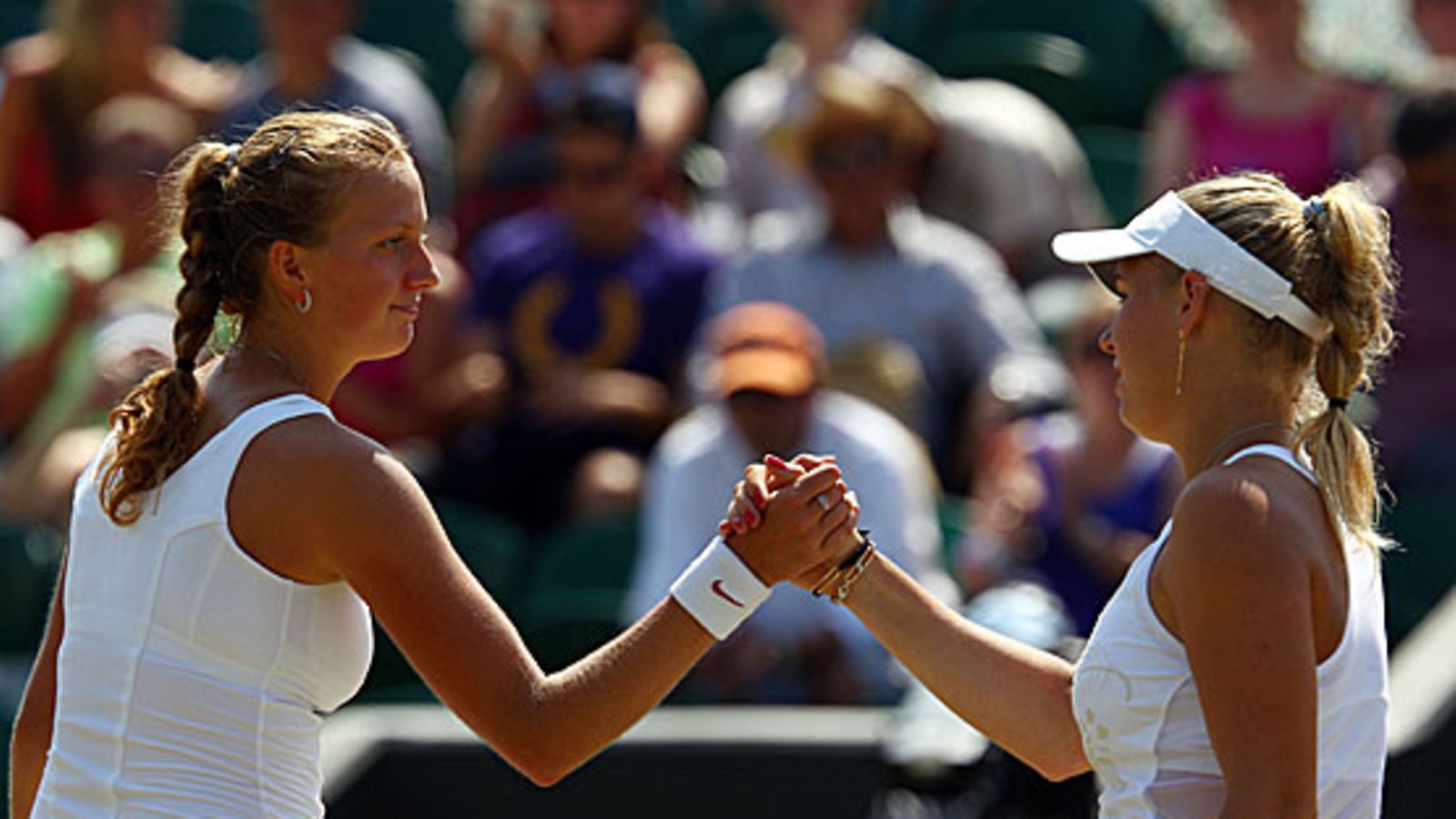 Petra Kvitova ja Caroline Wozniaki. Kuva: Clive Brunskill/GETTY.