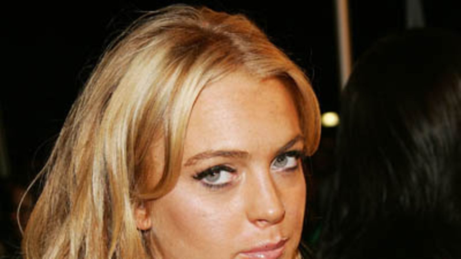 Lindsay Lohan on pulassa. (Kuva:Evan Agostini/Getty Images)