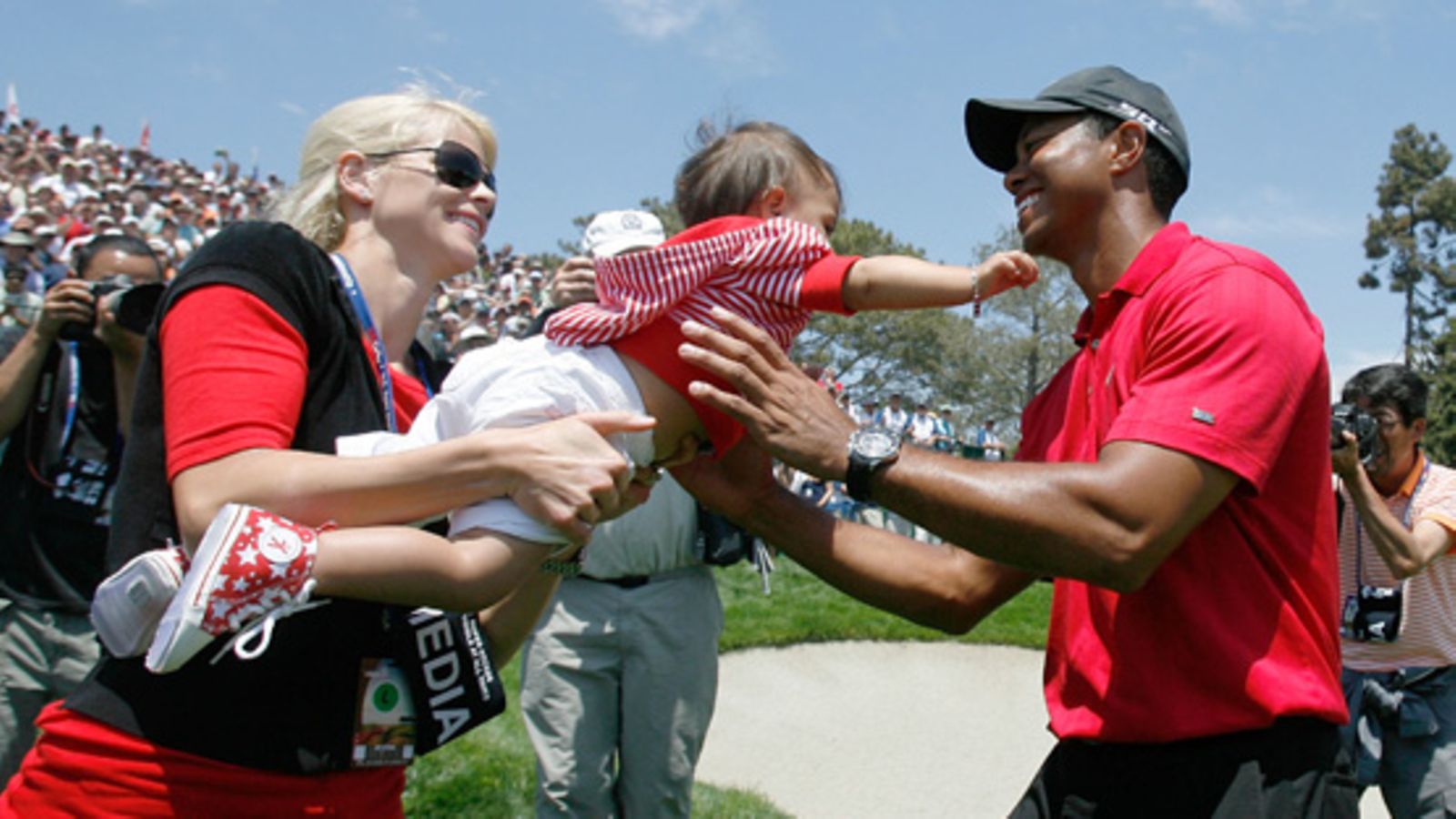 Elin, Sam ja Tiger Woods (Getty)