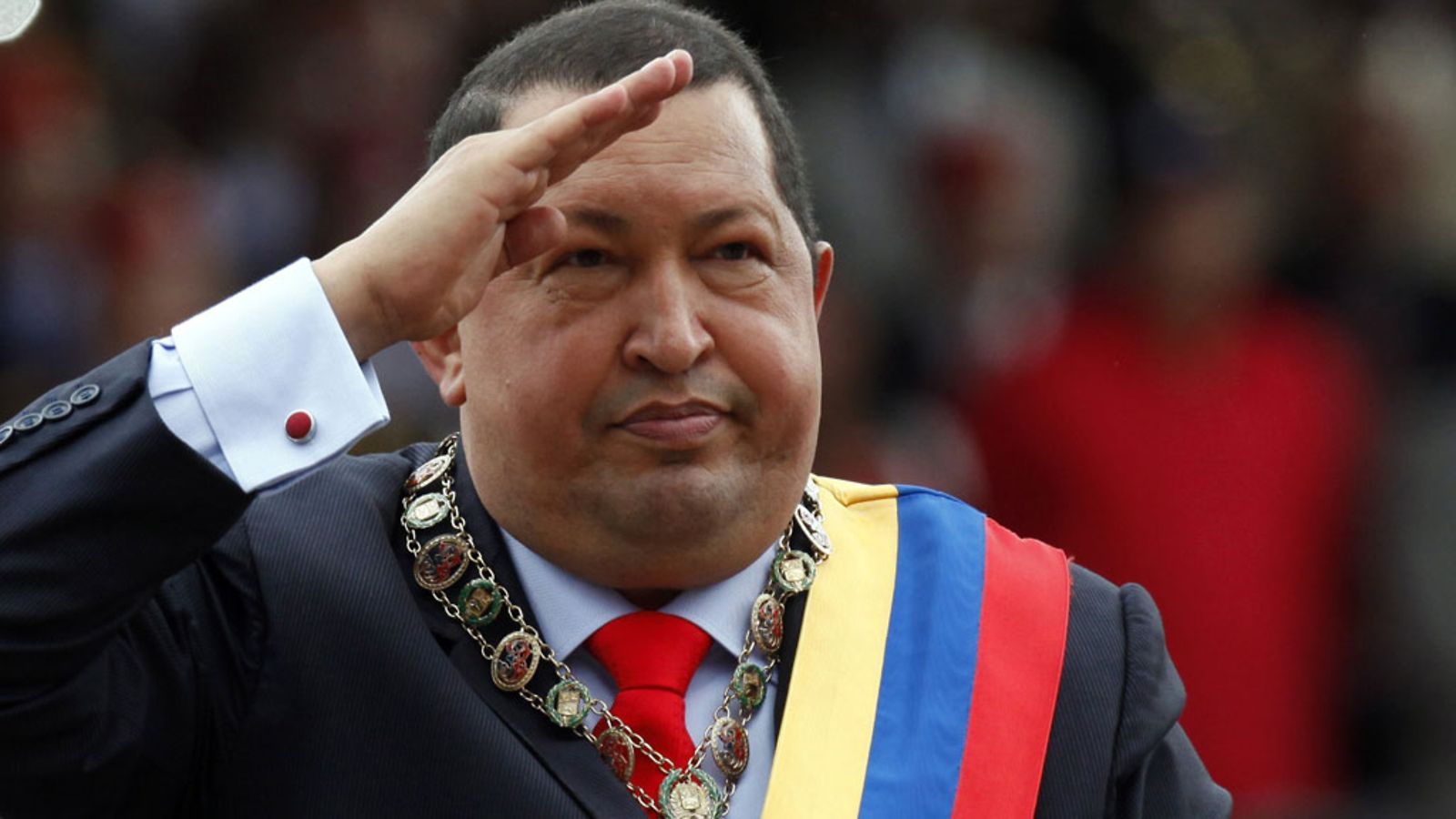 A file photo dated 04 February 2012 shows Venezuelan President Hugo Chavez saluting during a military parade at Paseo de los Heroes, in downtown Caracas, Venezuela. According to media reports on 05 March 2013, Venezuelan President Hugo Chavez was in critical condition after suffering a 'new and severe respiratory infection' two weeks after returning from Cuba where he underwent surgery in December, the government said.