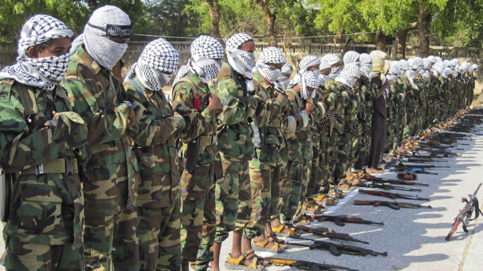 Members of Somalia's Al Qaeda-backed Islamic militia al-Shabab pray for the Eid al-Adha, or Festival of Sacrifice, in Mogadishu, Somalia, 16 November 2010. Eid al-Adha is a Muslim celebration commemorating Abraham's willingness to sacrifice his son Ishmael as an act of obedience to God. Al-Shabab vowed to continue their fight against fragile Transitional Federal Government (TFG) and urged Somali women and children to join the Jihad.