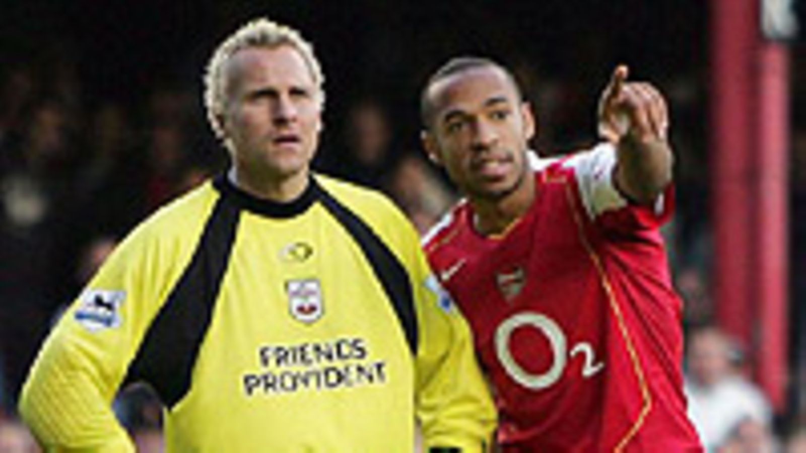 Antti Niemi ja Thierry Henry, kuva: Clive Rose/Getty Images