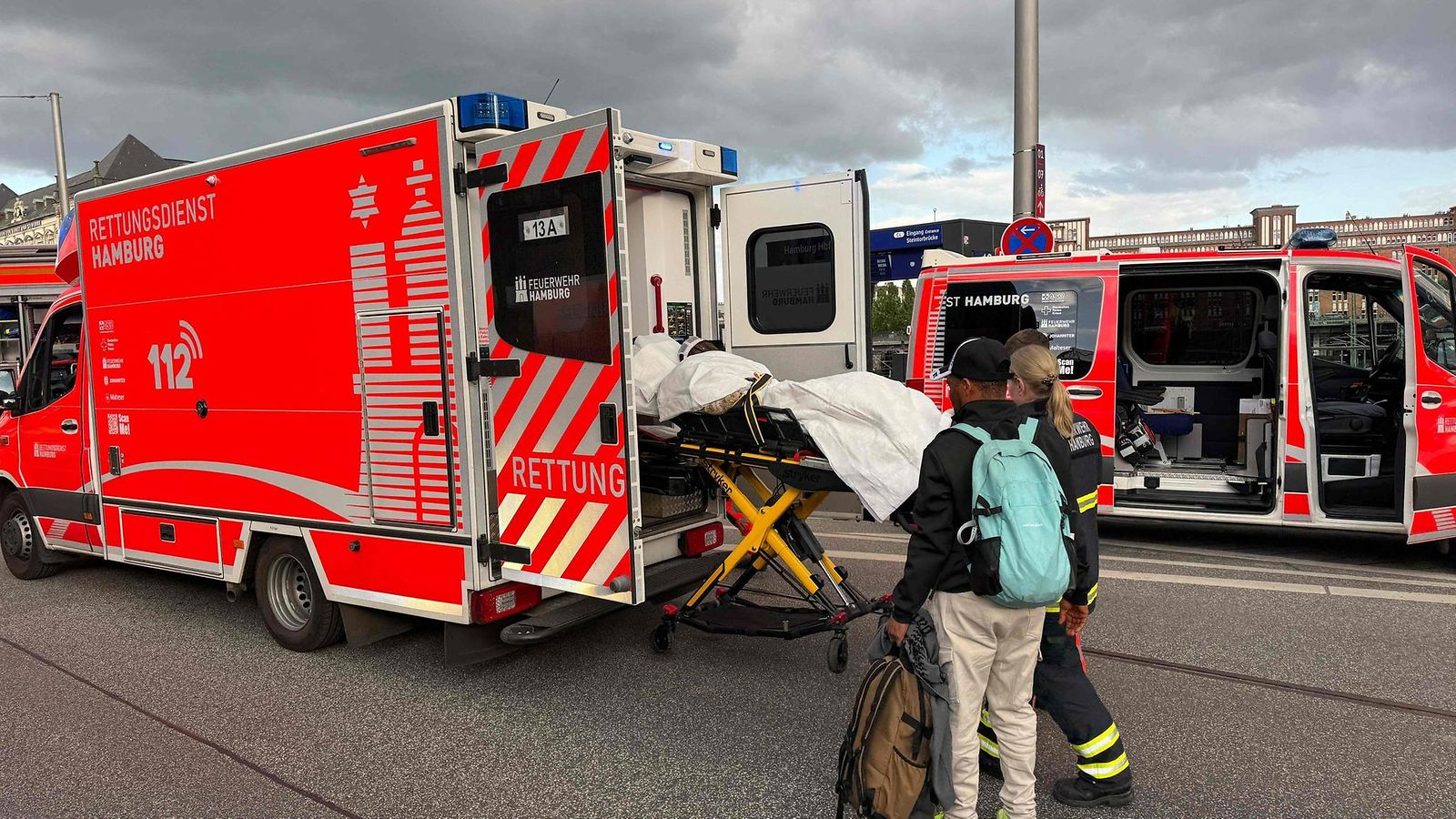 Members of the emergency services work at the scene at Hamburg's main train station where several people have been stabbed on May 23, 2025