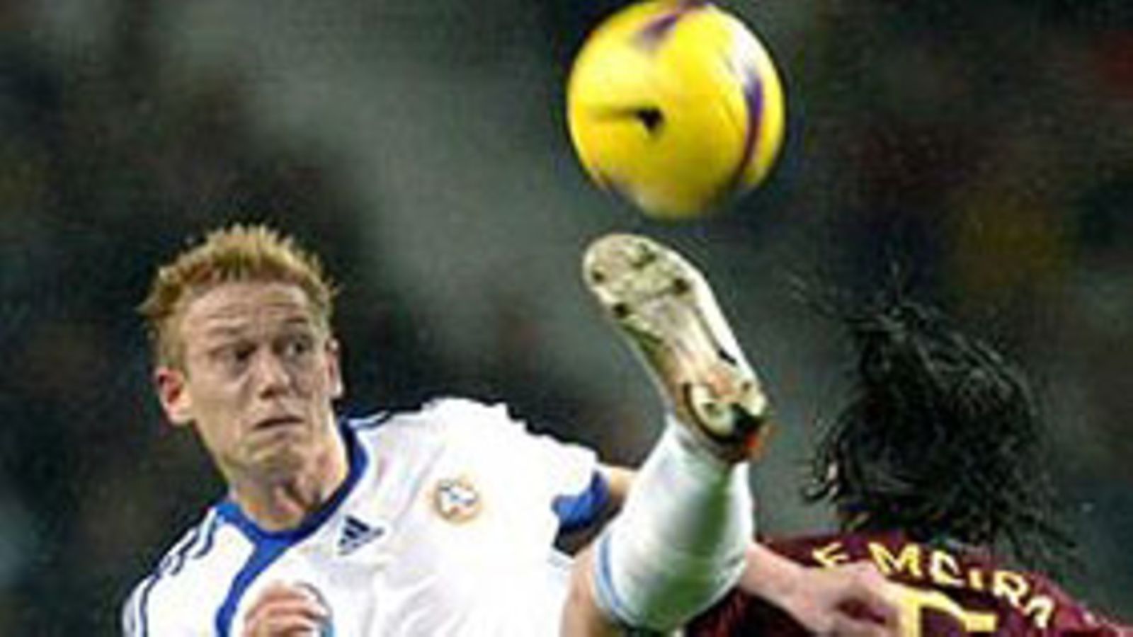 Mikael Forssell, Suomi (vas.) ja Fernando Meira, Portugali, Photo: Estela Silva / EPA