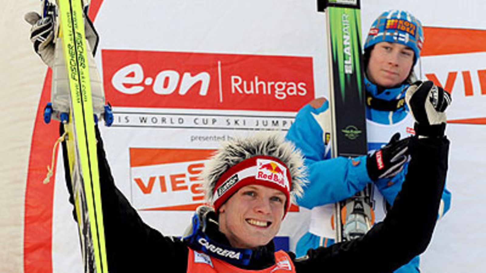 Thomas Morgenstern ja Janne Happonen, kuva: EPA/ROBERT GILHOOLY