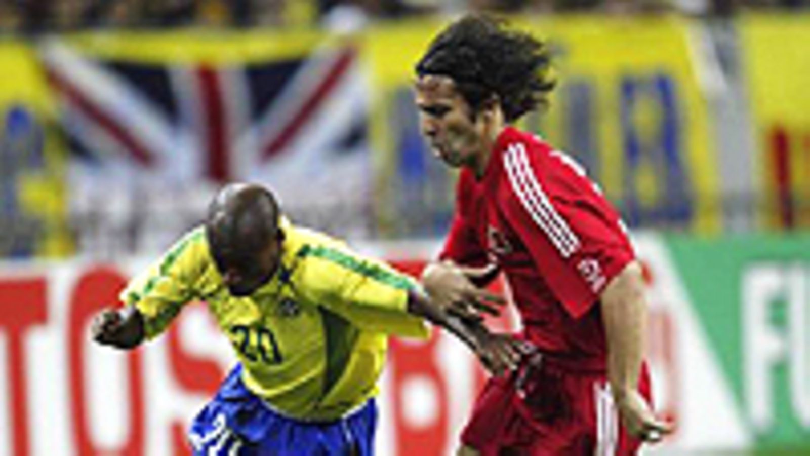 Brasilian Edilson & Turkin Bulent Korkmaz (Photo: David Cannon/Getty Images)