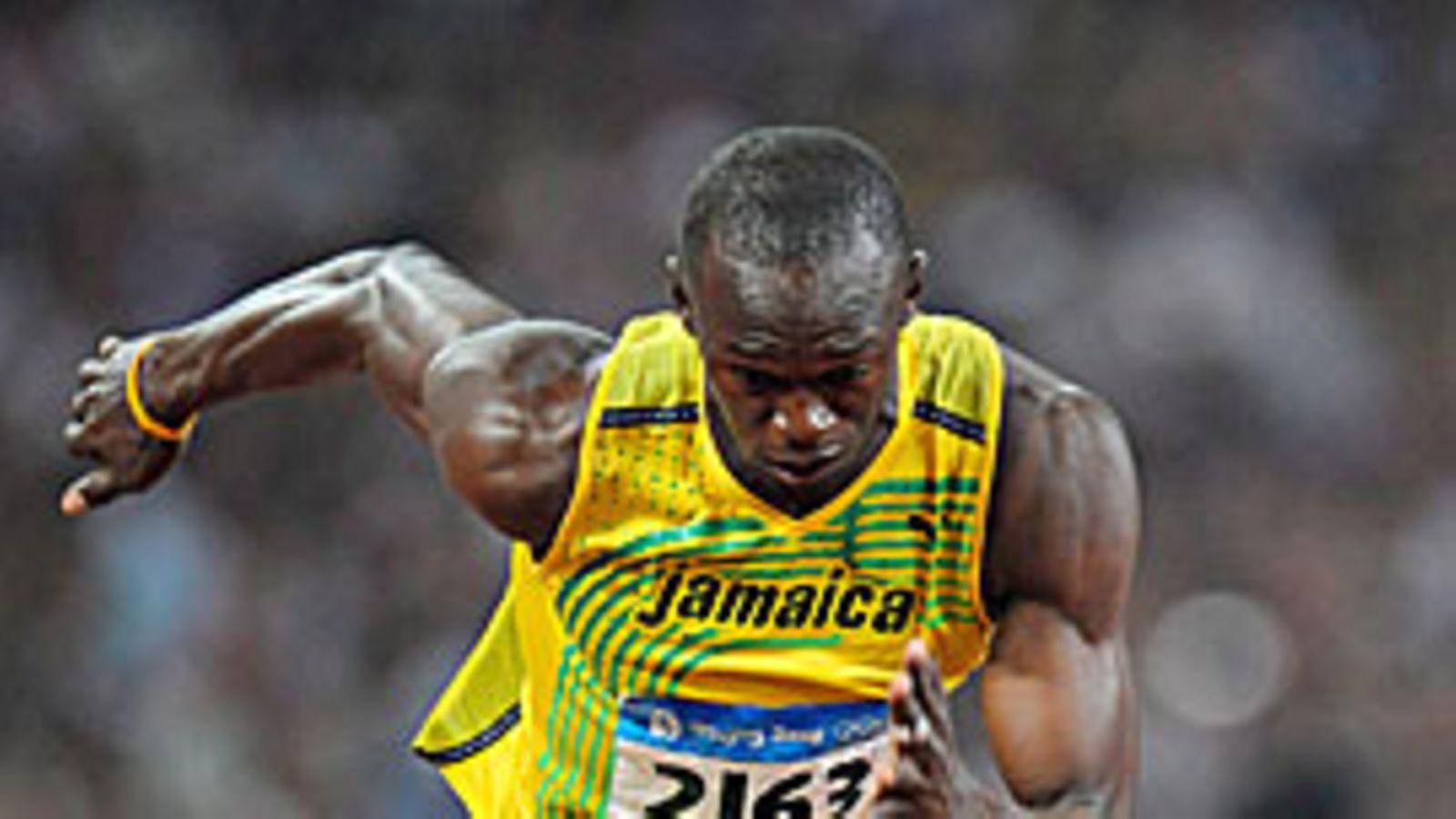 Usain Bolt lähtökiihdytyksessä, kuva: EPA/Gero Breloer